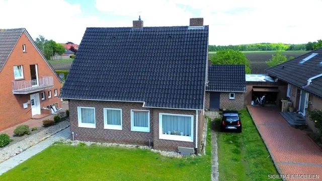 Solides Einfamilienhaus mit Entwicklungspotential in ruhiger Siedlungslage - Provisionsfrei