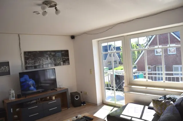 Wohnzimmer DG Wohnung links Bild 1
