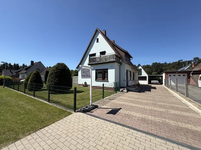 Dörverden: Charmantes Siedlungshaus mit Carport und Nebengebäude auf großem Gartengrundstück