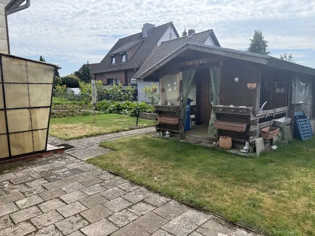 Dörverden - Hülsen: vermietetes Siedlungshaushaus mit großem Gartengrundstück in ruhiger Wohnlage
