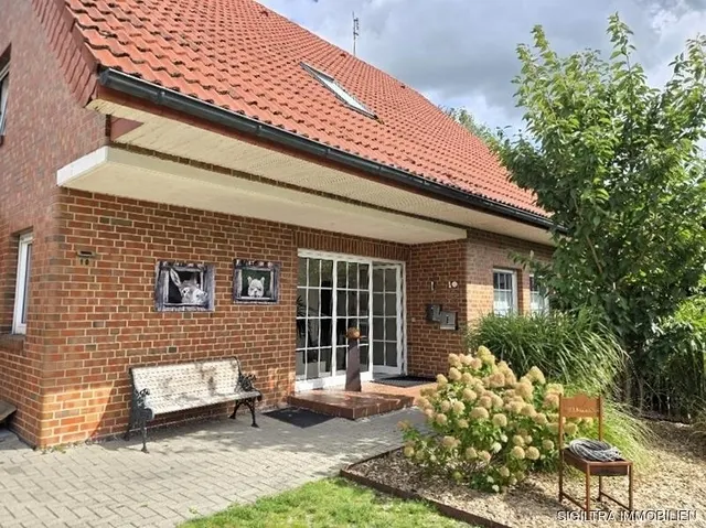 Provisionsfrei! Familienglück pur– großzügiges Ein-/Zweifamilienhaus mit Wintergarten in Lähden