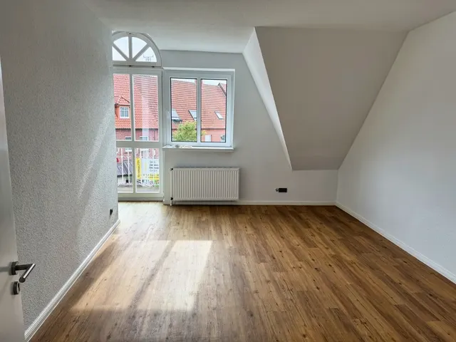 Zentral wohnen – Dachgeschosswohnung direkt am Marktplatz!