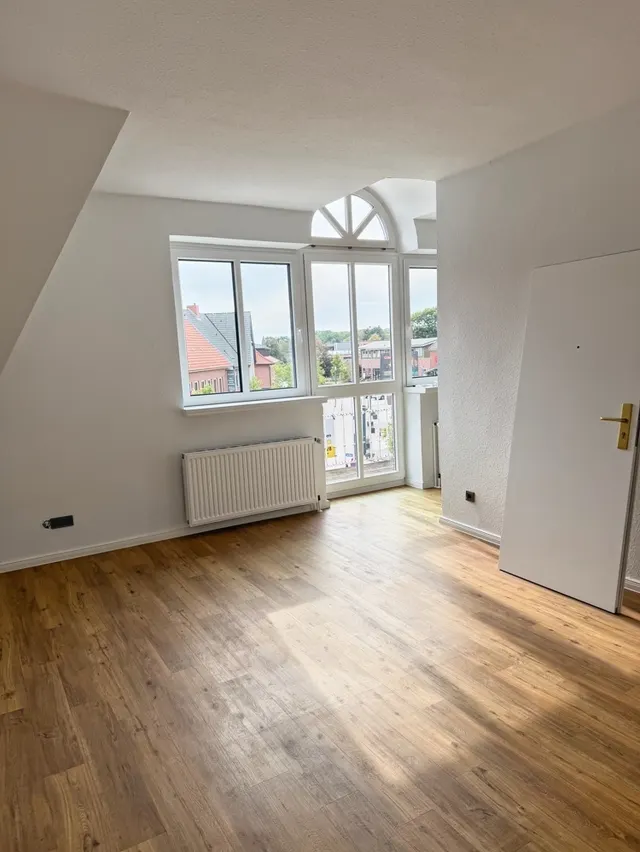 Zentral wohnen – Dachgeschosswohnung direkt am Marktplatz!